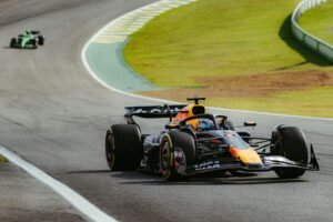 Action-packed scene of a Formula 1 race car speeding on the track at Interlagos, São Paulo, Brazil.